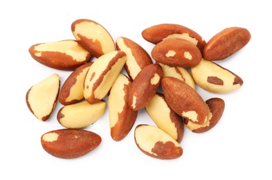 Photo of Heap of Brazil nuts isolated on white, top view