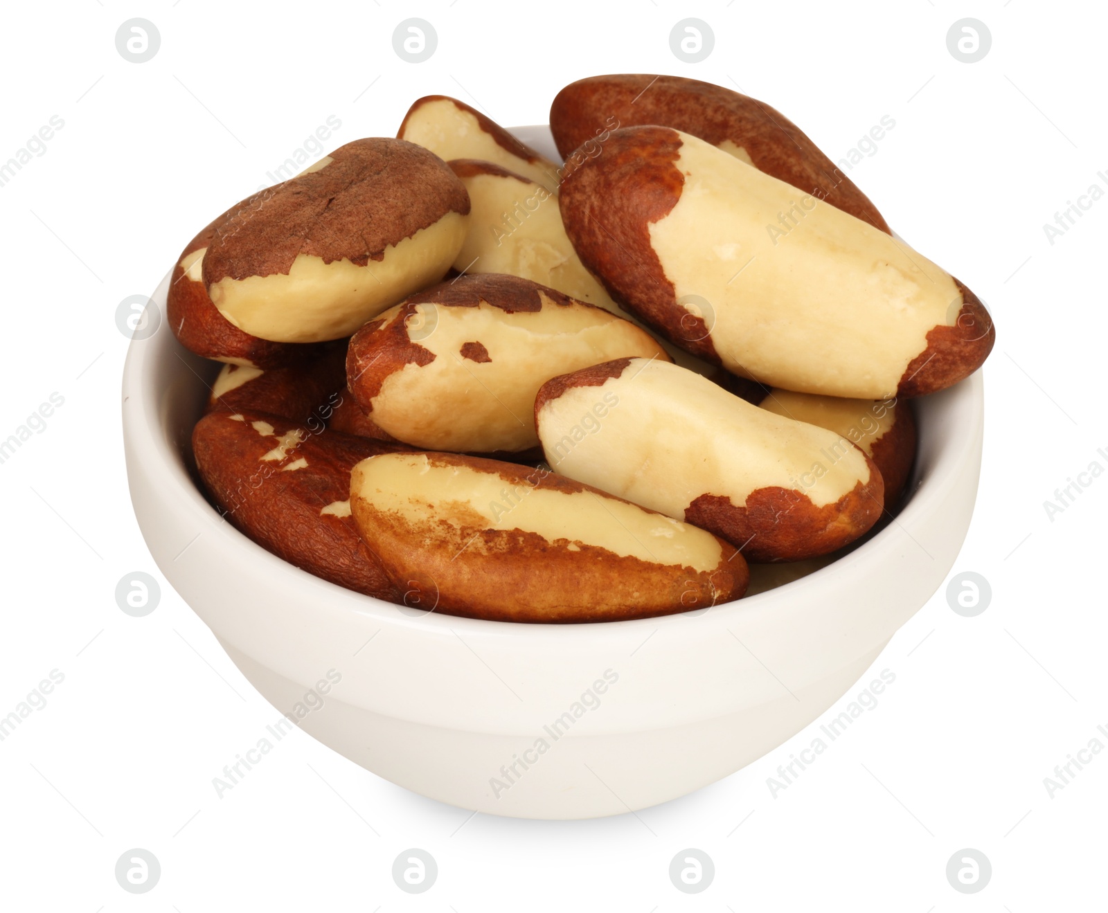 Photo of Tasty Brazil nuts in bowl isolated on white