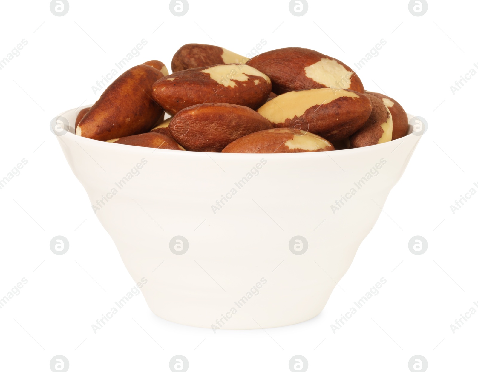 Photo of Tasty Brazil nuts in bowl isolated on white