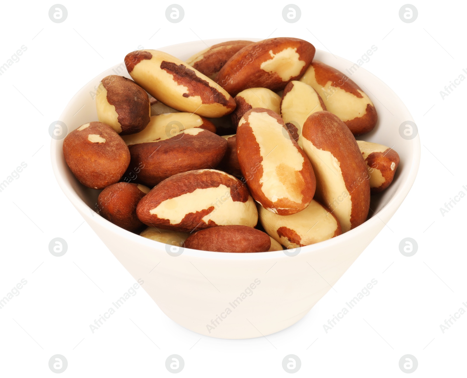 Photo of Tasty Brazil nuts in bowl isolated on white