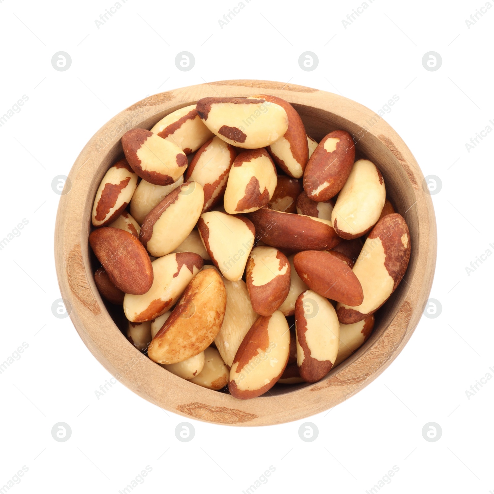 Photo of Tasty Brazil nuts in bowl isolated on white, top view