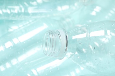 Many plastic bottles as background, closeup view