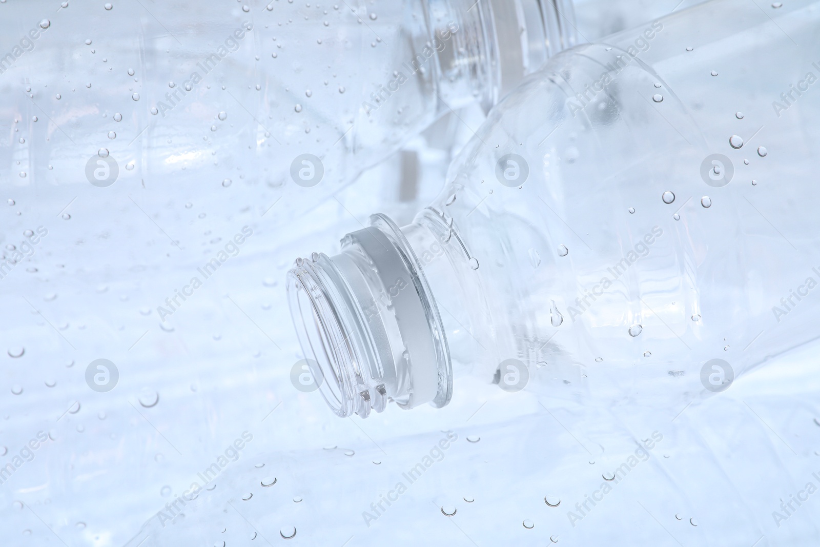 Photo of Many plastic bottles as background, closeup view