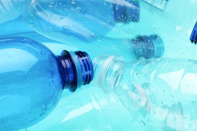 Many plastic bottles as background, closeup view