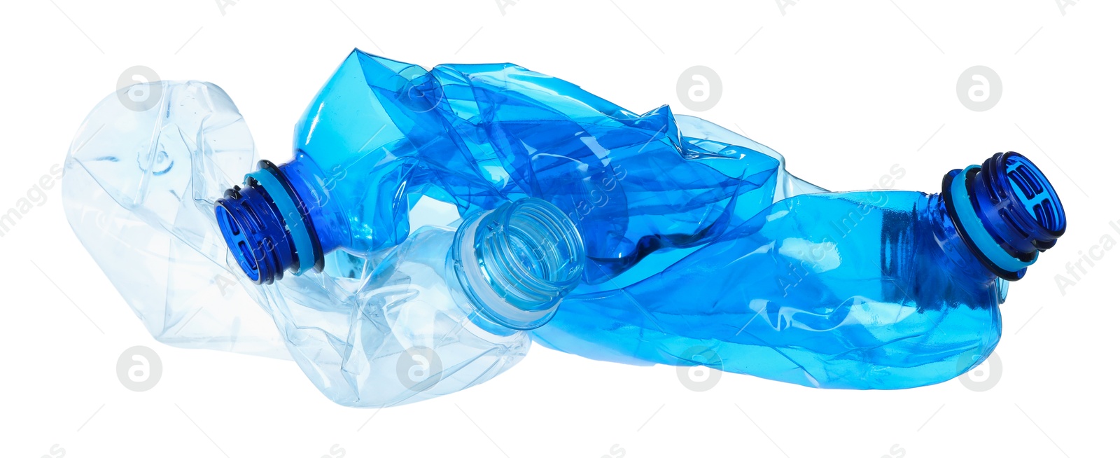 Photo of Crumpled empty plastic bottles isolated on white