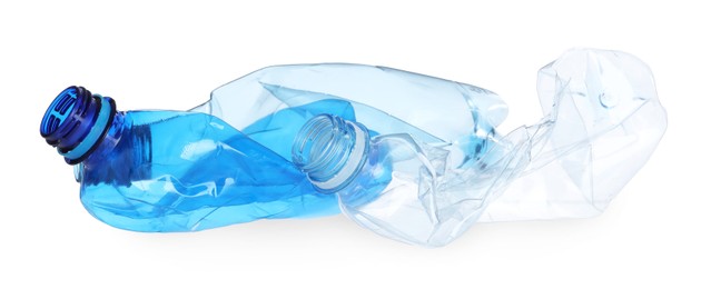 Photo of Crumpled empty plastic bottles isolated on white