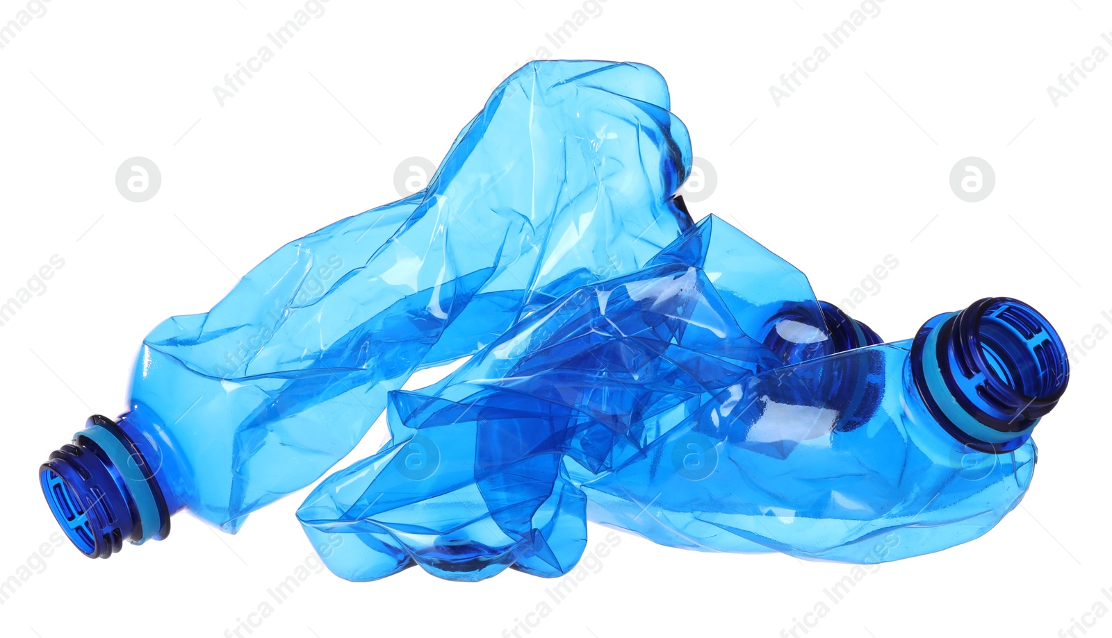 Photo of Crumpled empty plastic bottles isolated on white