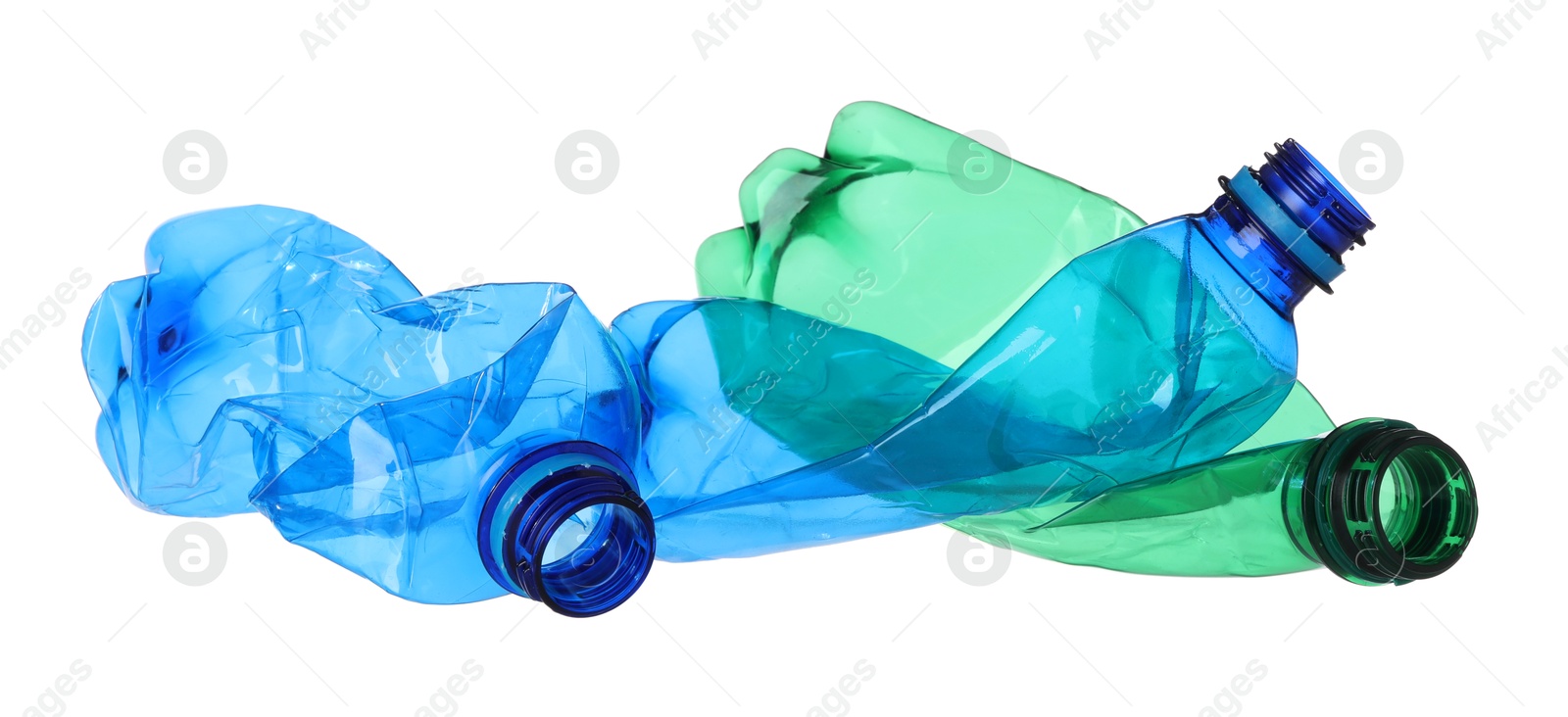 Photo of Crumpled empty plastic bottles isolated on white