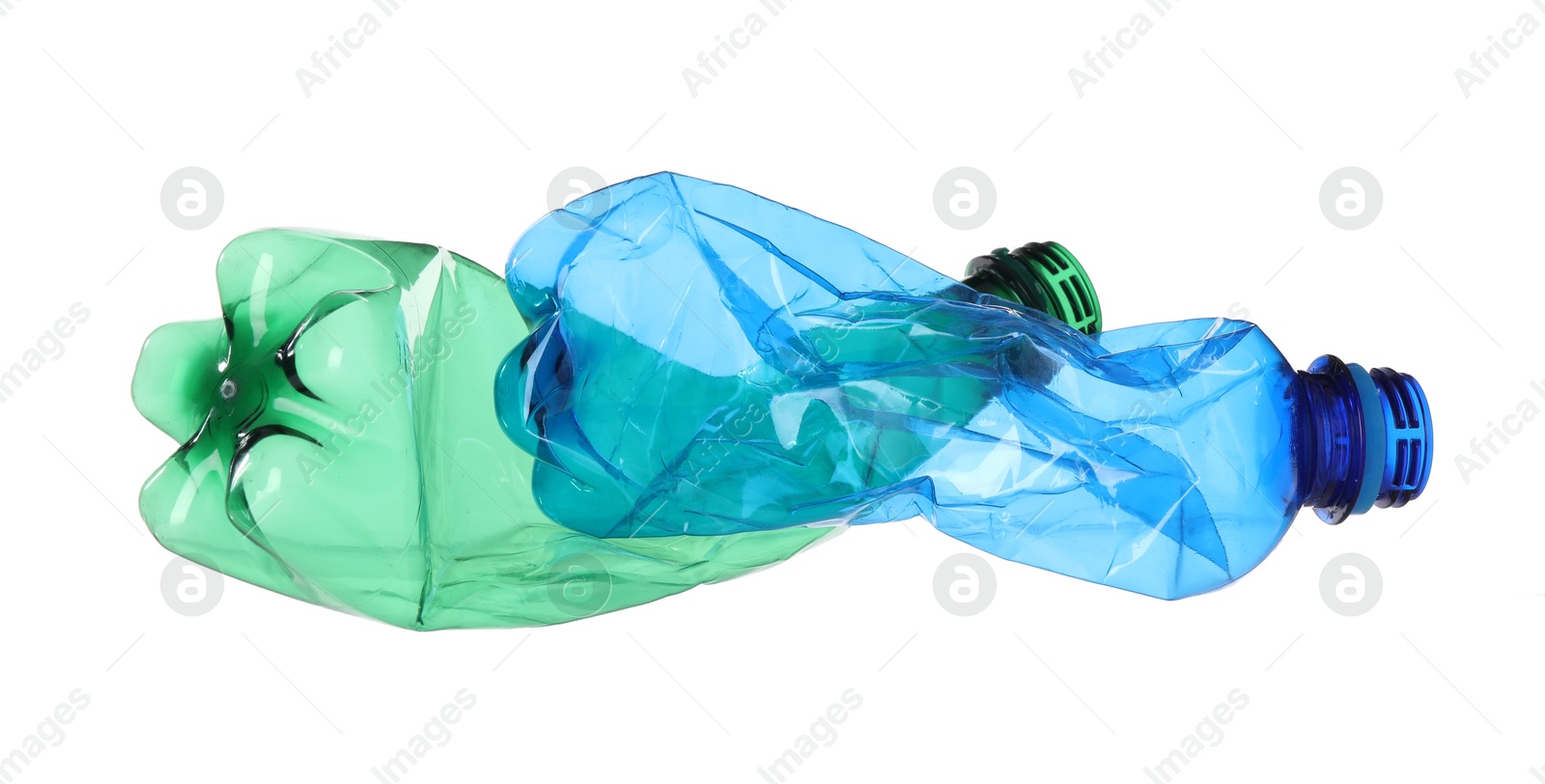 Photo of Crumpled empty plastic bottles isolated on white