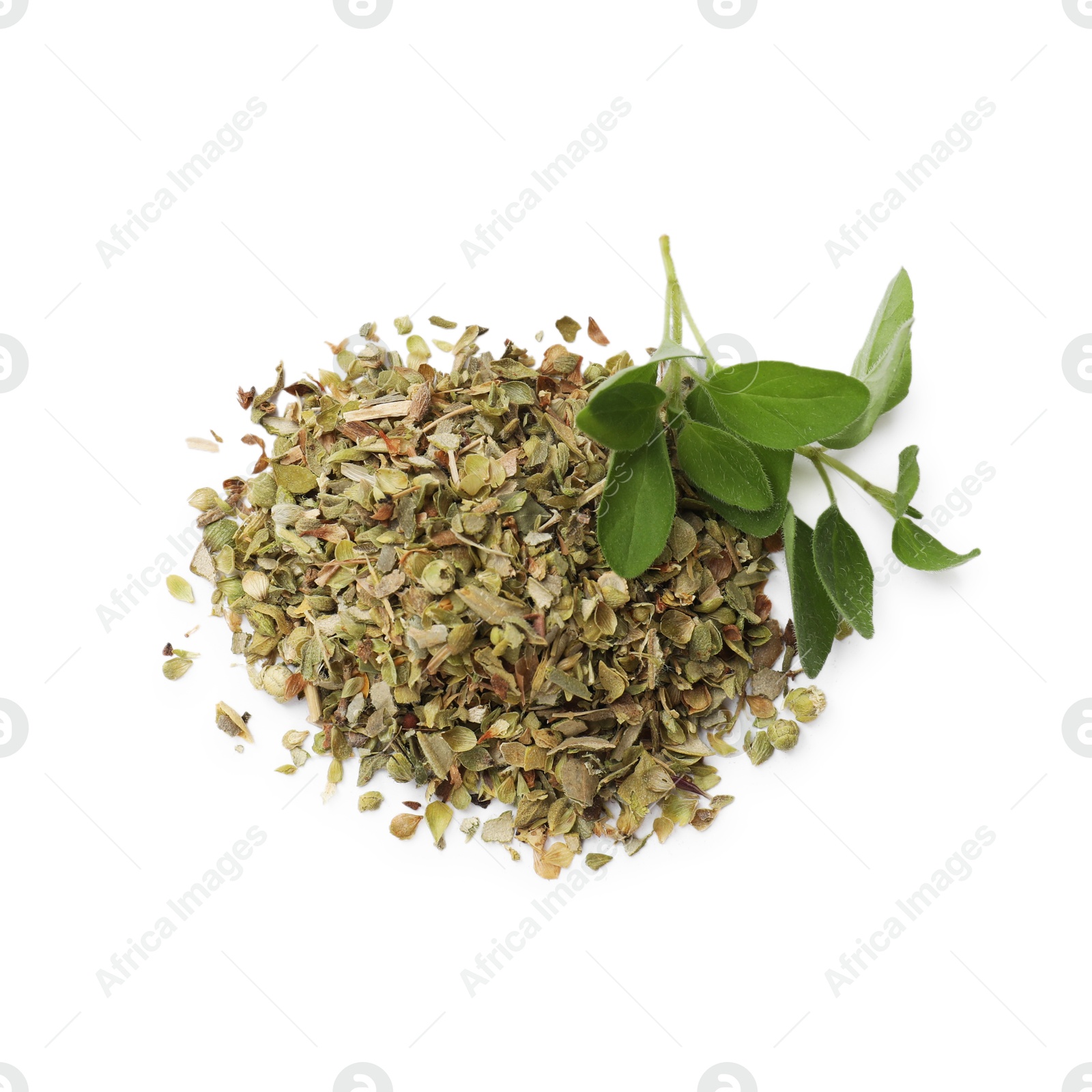 Photo of Dried oregano and green leaves isolated on white