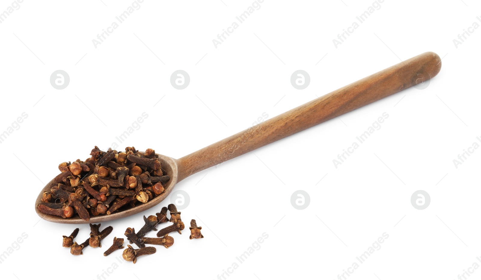 Photo of Dry clove buds in wooden spoon on white background. Aromatic spice