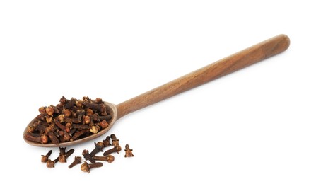 Photo of Dry clove buds in wooden spoon on white background. Aromatic spice