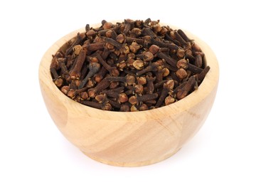 Photo of Dry clove buds in wooden bowl on white background. Aromatic spice