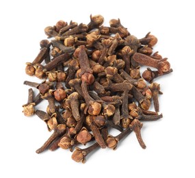 Photo of Pile of dry clove buds on white background. Aromatic spice