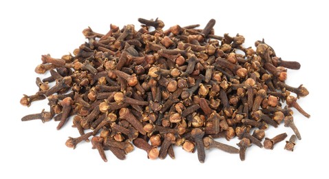 Photo of Pile of dry clove buds on white background. Aromatic spice