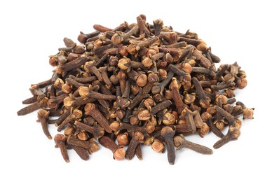 Photo of Pile of dry clove buds on white background. Aromatic spice