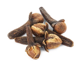 Photo of Dry clove buds on white background. Aromatic spice