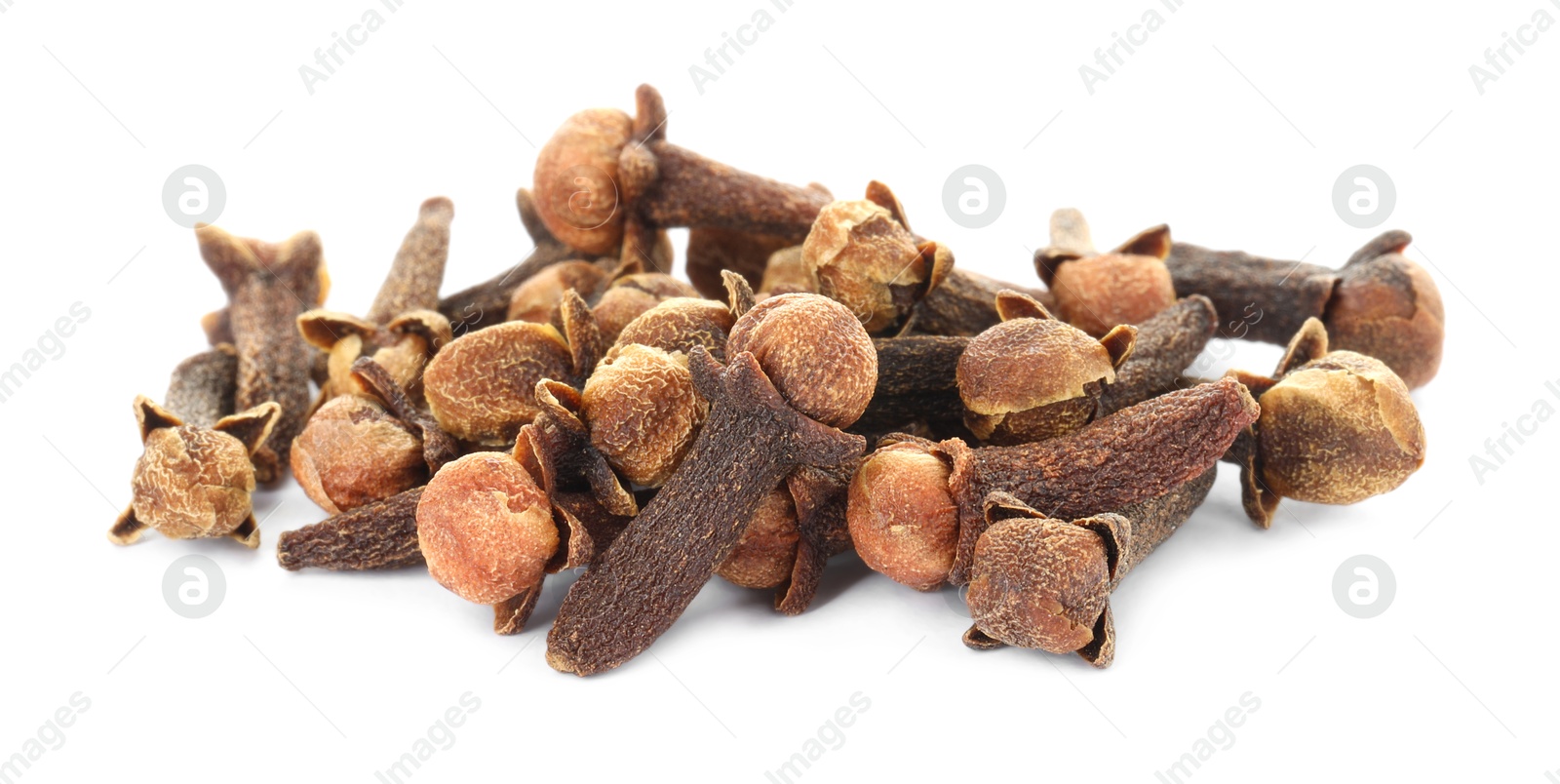 Photo of Pile of dry clove buds on white background. Aromatic spice