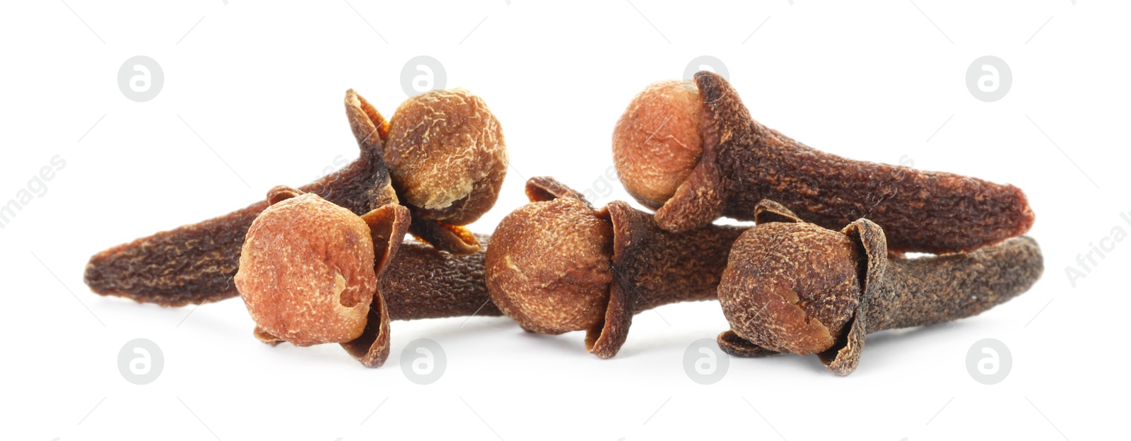 Photo of Dry clove buds on white background. Aromatic spice