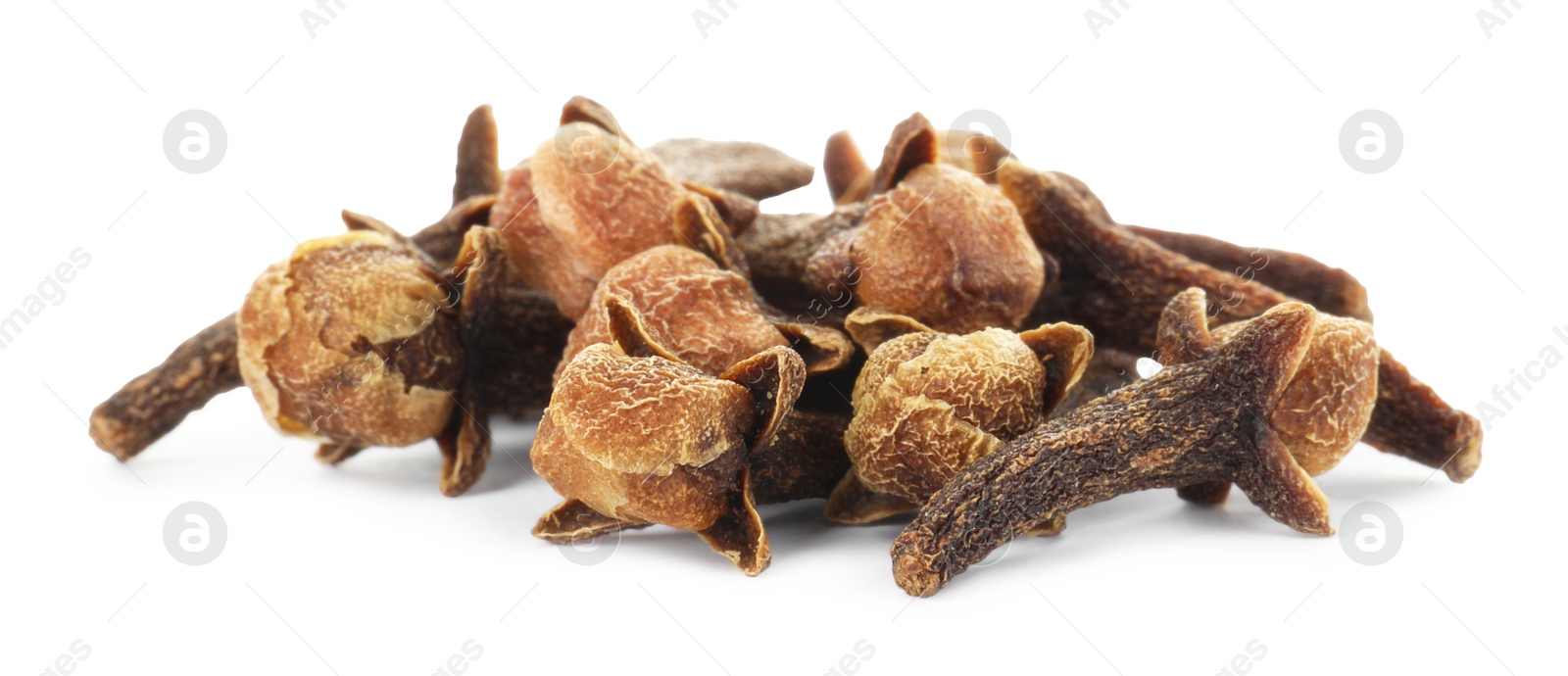 Photo of Pile of dry clove buds on white background. Aromatic spice