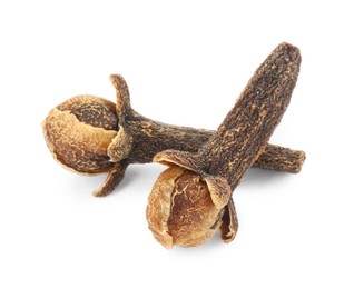 Photo of Dry clove buds on white background. Aromatic spice