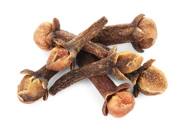 Photo of Dry clove buds on white background. Aromatic spice