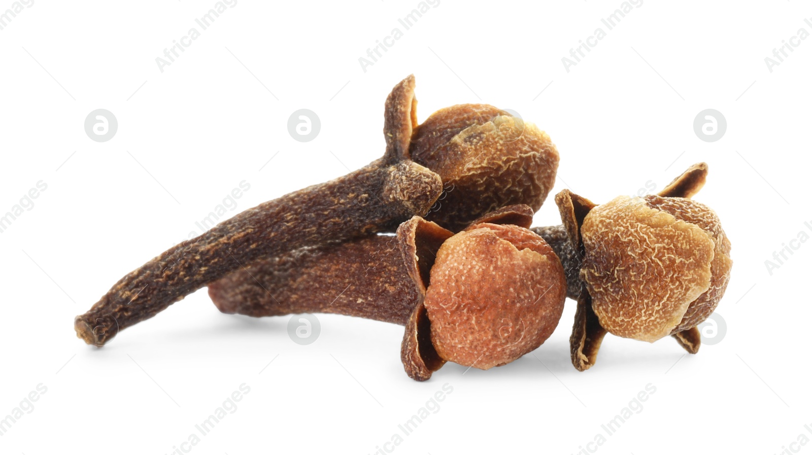 Photo of Dry clove buds on white background. Aromatic spice