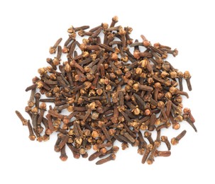 Photo of Pile of dry clove buds on white background, top view. Aromatic spice