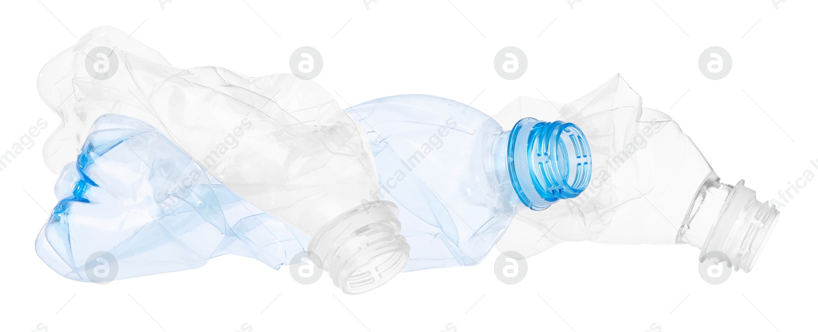 Photo of Crumpled empty plastic bottles isolated on white