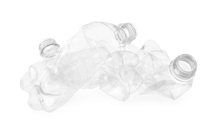 Crumpled empty plastic bottles isolated on white