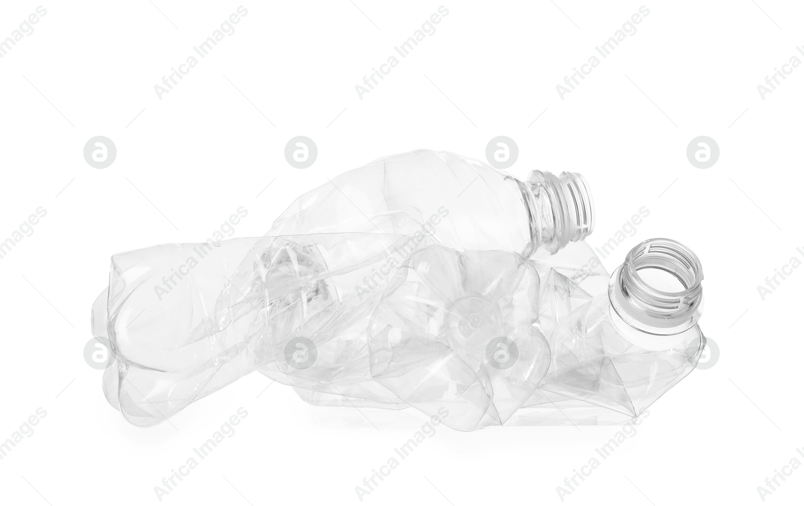 Photo of Crumpled empty plastic bottles isolated on white