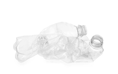 Photo of Crumpled empty plastic bottles isolated on white