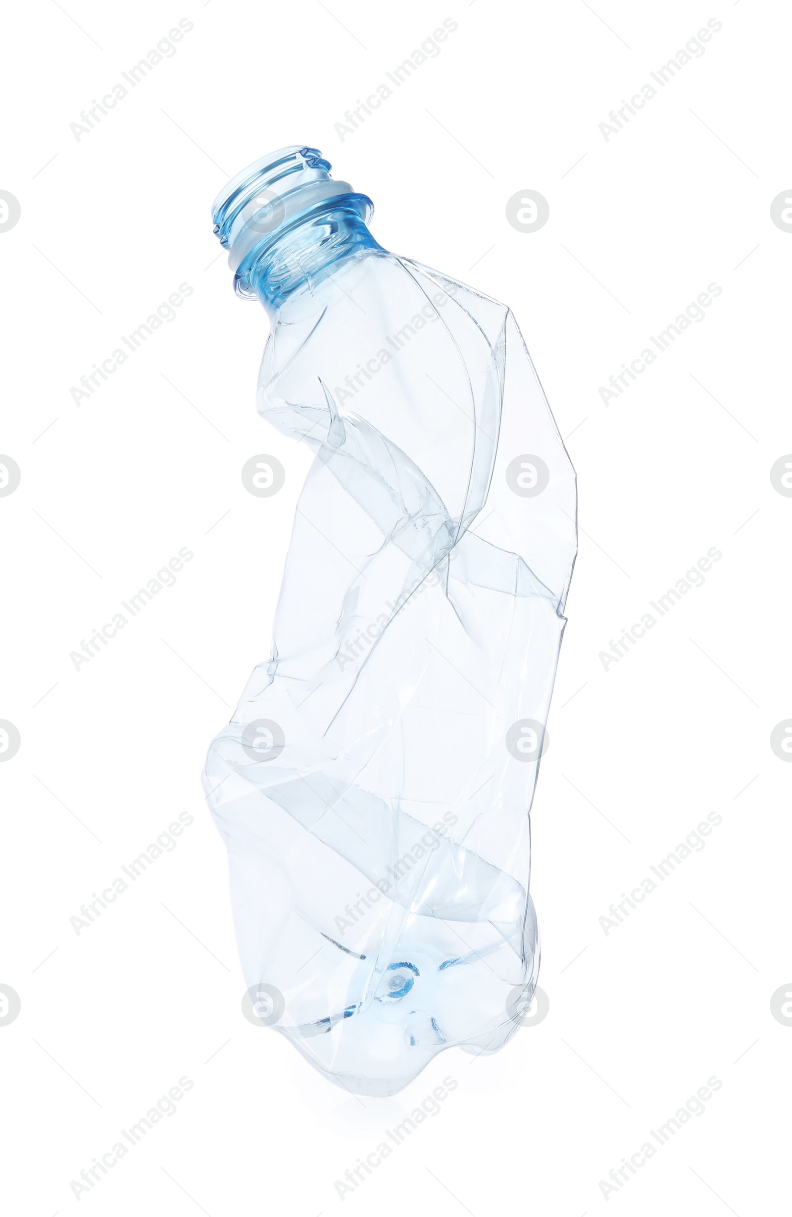 Photo of One crumpled plastic bottle isolated on white