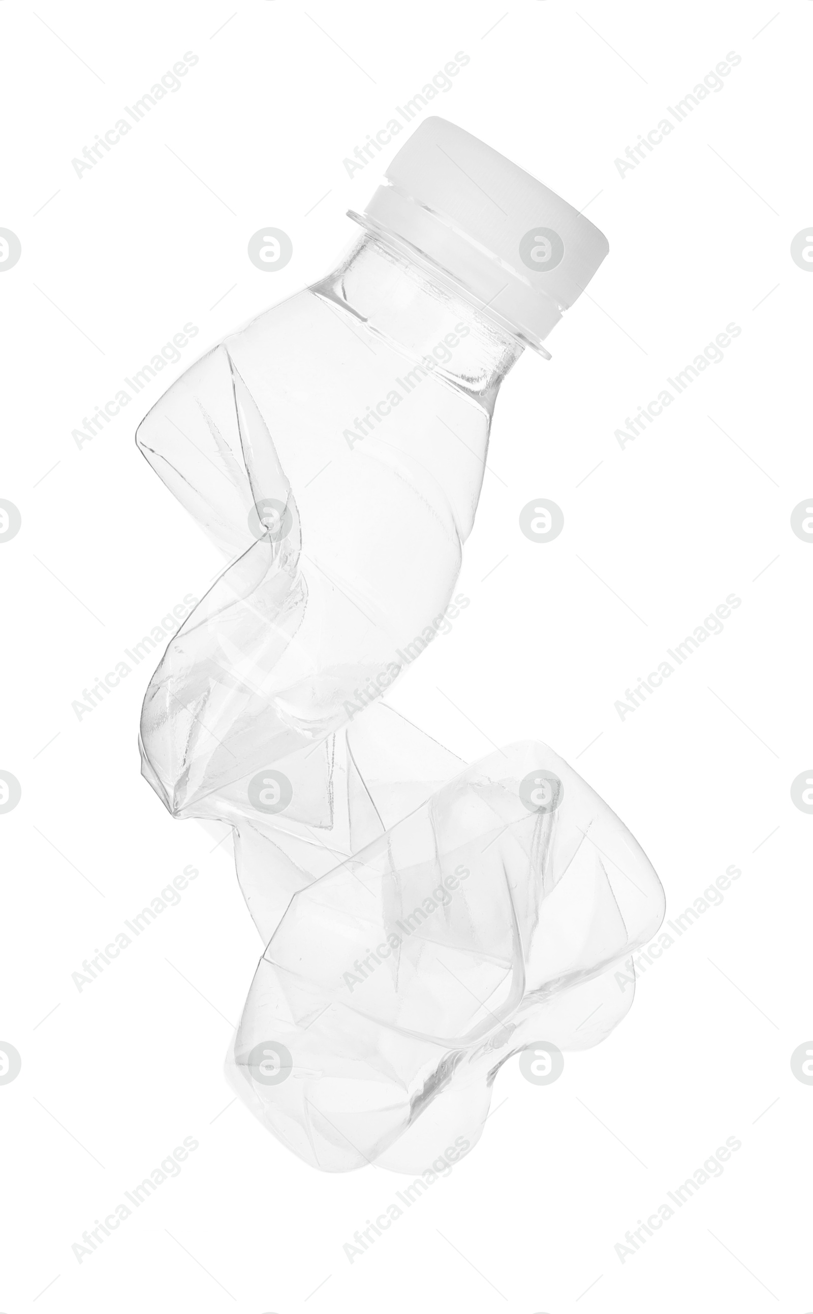 Photo of One crumpled plastic bottle isolated on white