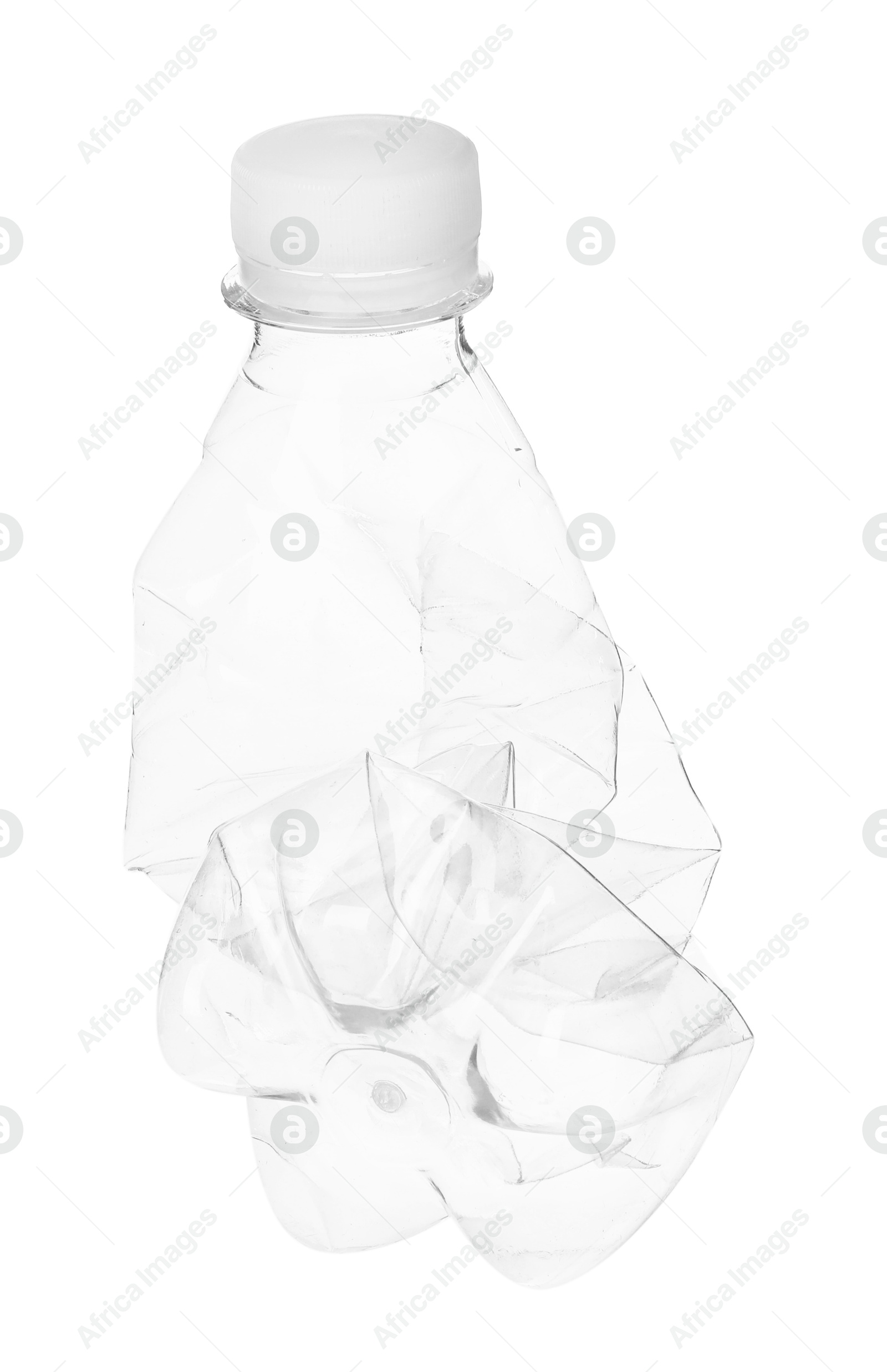 Photo of One crumpled plastic bottle isolated on white