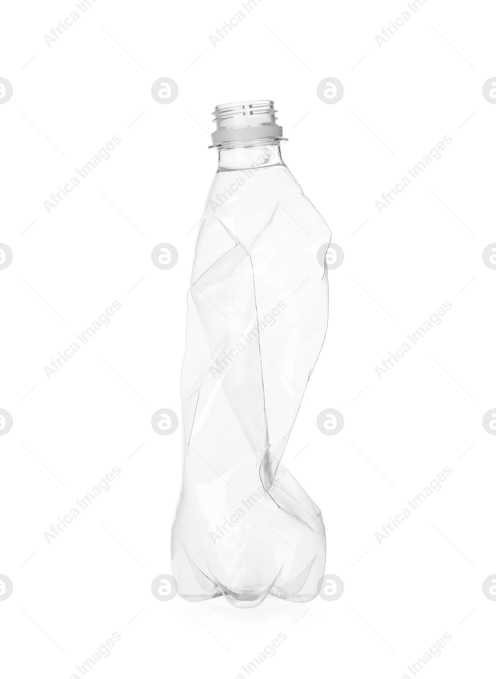 Photo of One crumpled plastic bottle isolated on white