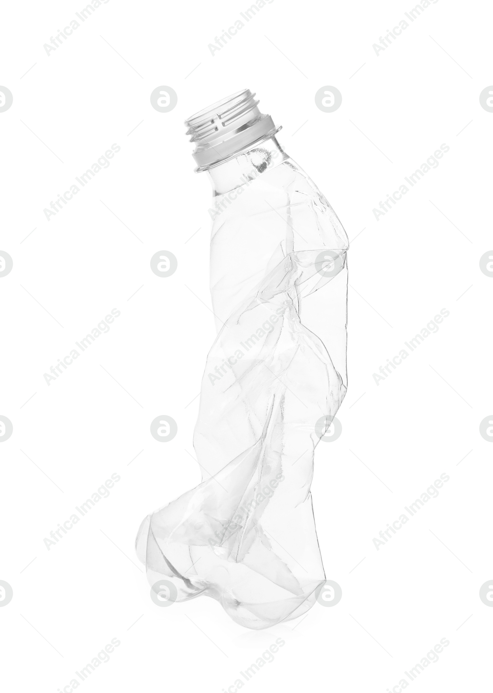 Photo of One crumpled plastic bottle isolated on white