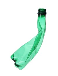 Photo of One crumpled plastic bottle isolated on white