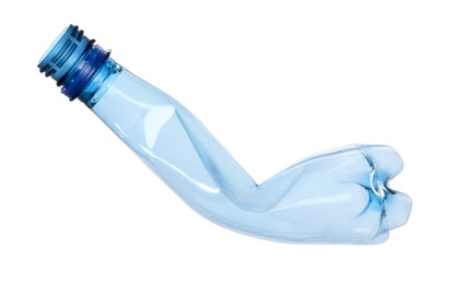 Photo of One crumpled plastic bottle isolated on white