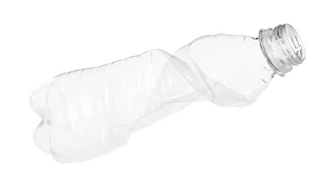 Photo of One crumpled plastic bottle isolated on white