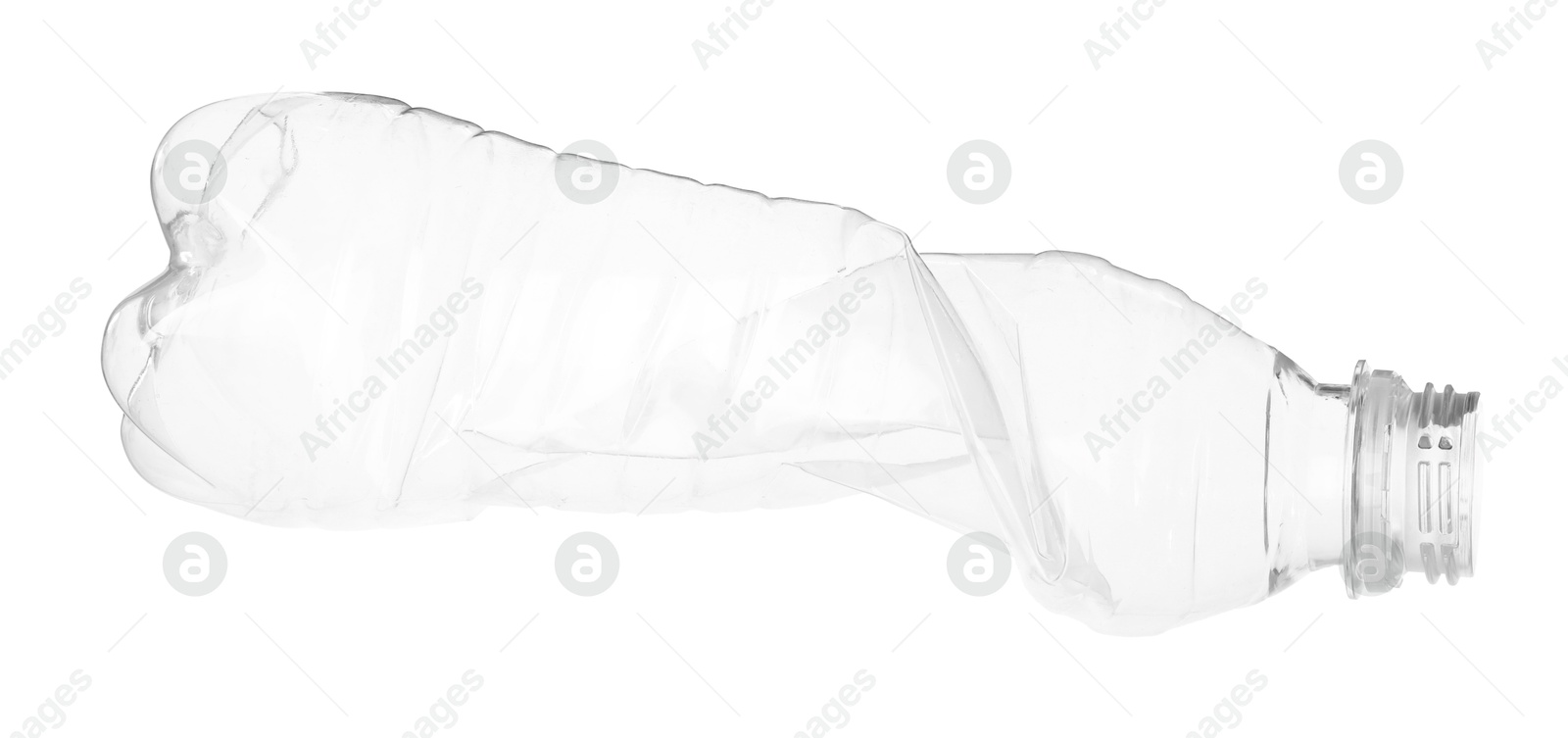 Photo of One crumpled plastic bottle isolated on white