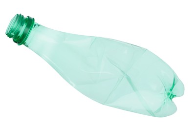 Photo of One crumpled plastic bottle isolated on white