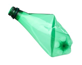 Photo of One crumpled plastic bottle isolated on white