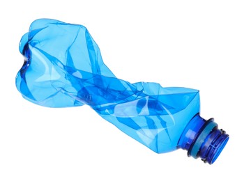 Photo of One crumpled plastic bottle isolated on white