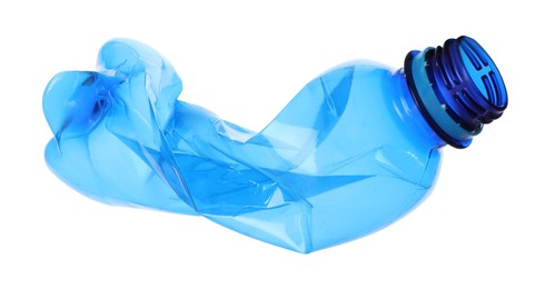 Photo of One crumpled plastic bottle isolated on white