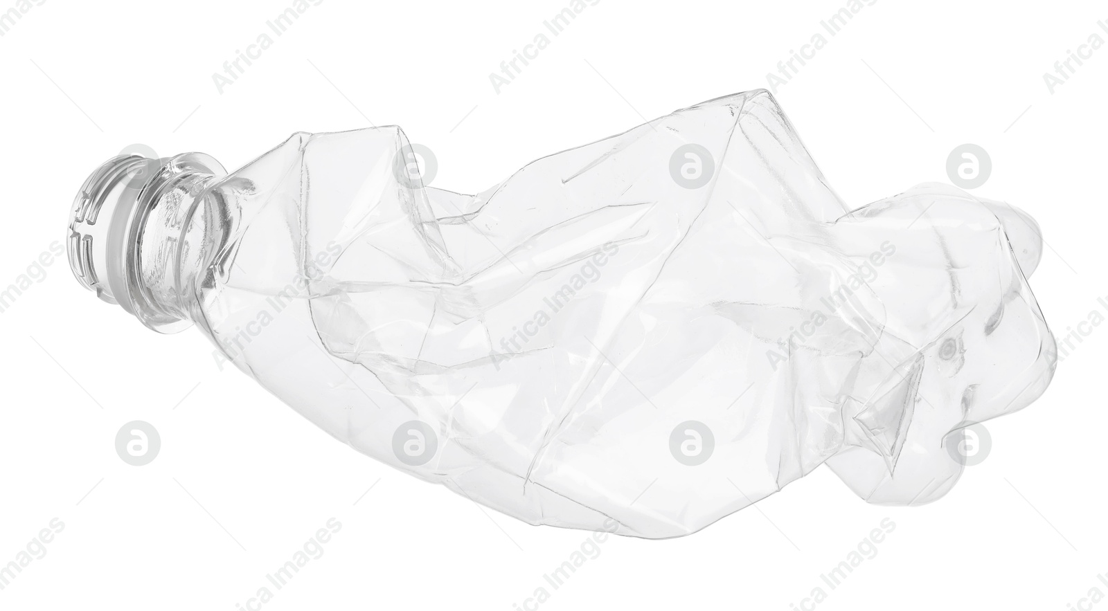 Photo of One crumpled plastic bottle isolated on white