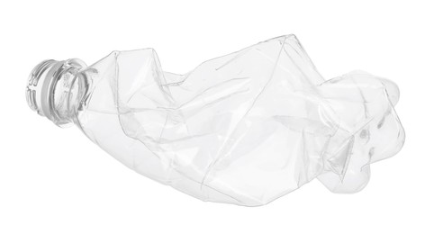 Photo of One crumpled plastic bottle isolated on white