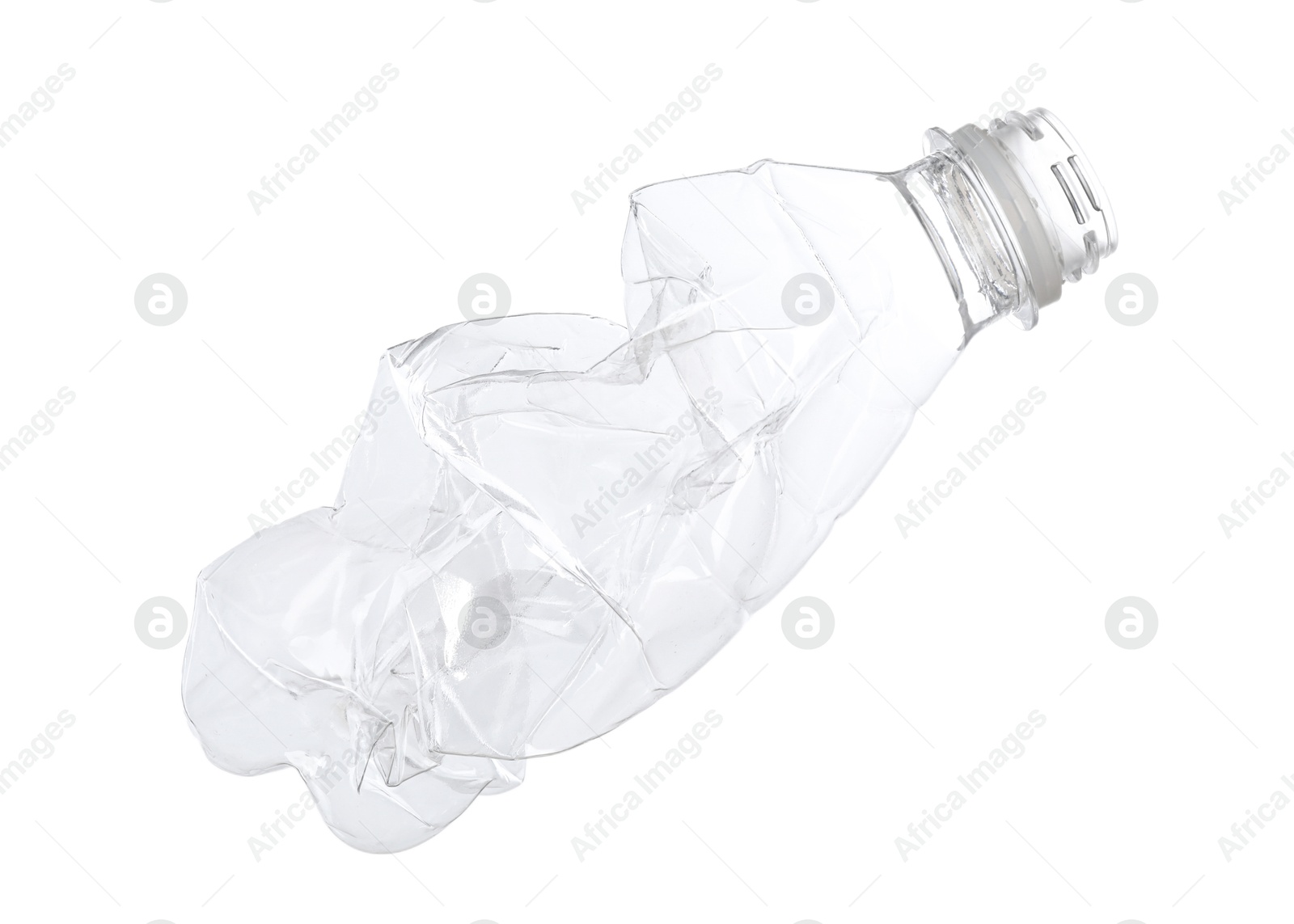 Photo of One crumpled plastic bottle isolated on white