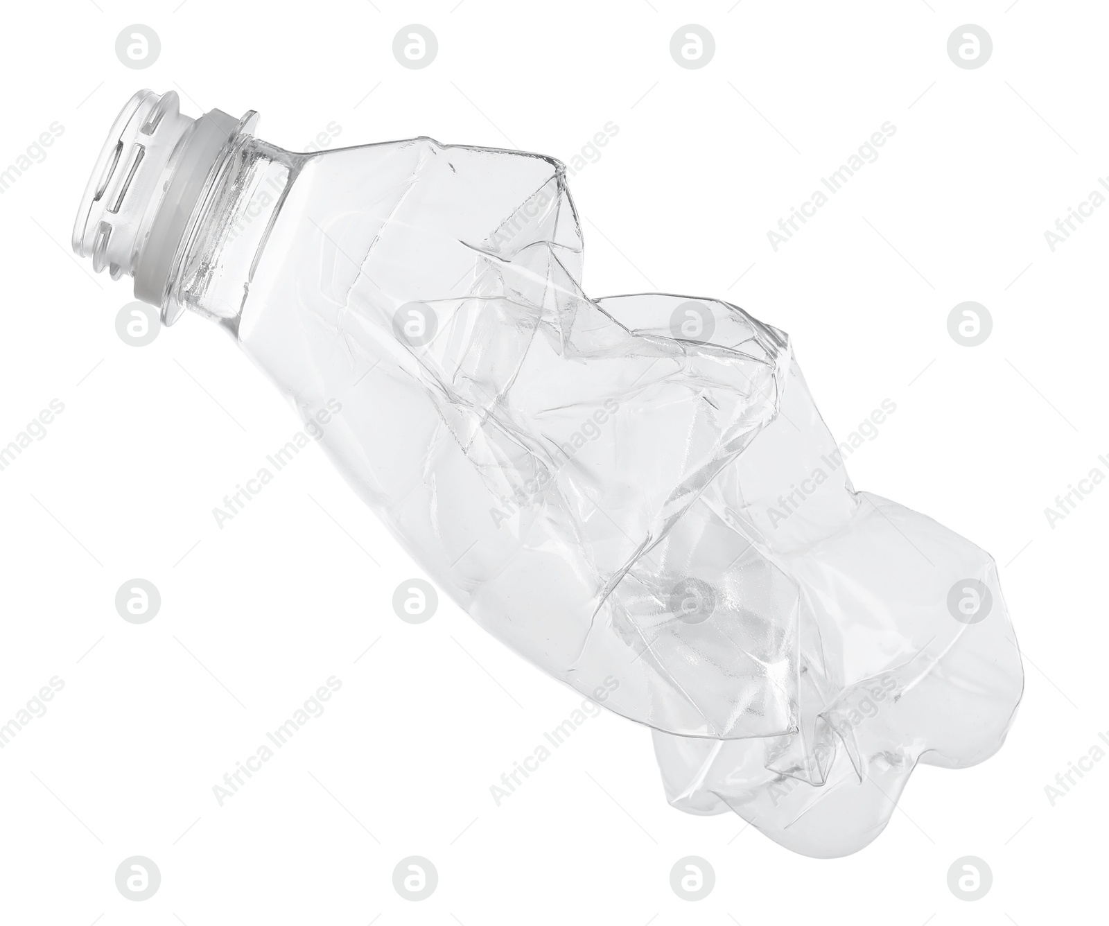 Photo of One crumpled plastic bottle isolated on white