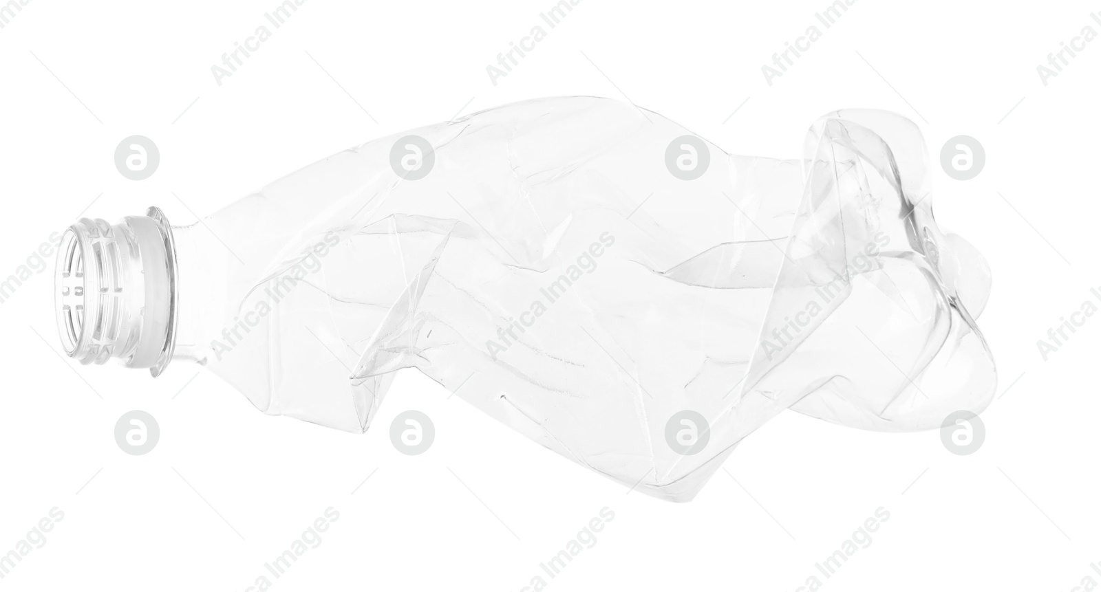 Photo of One crumpled plastic bottle isolated on white